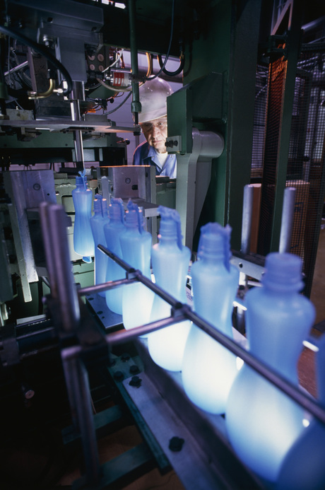 What are the risks posed by trace heavy metals in plastics?