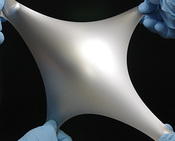 Thermally conductive rubber for soft, stretchy electronics