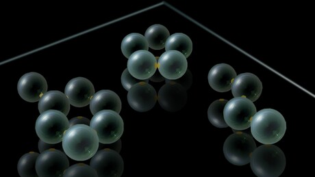 Micrometre molecular modelling with real chemical reactions