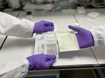 Stretchable fabric generates electricity from body movement