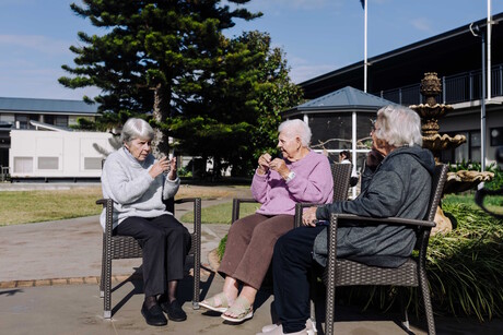 Two friends inspire staff, care residents to learn Auslan