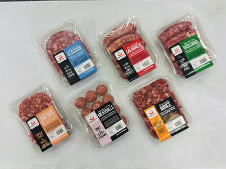 Sausage production transformed with linerless labelling