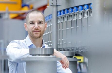 Bottle-filling physics: keeping it calm to prevent sloshing