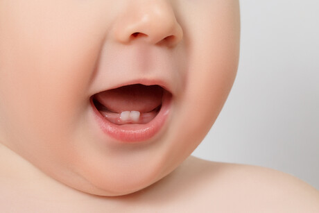 Babies of stressed mothers likely to get their teeth earlier