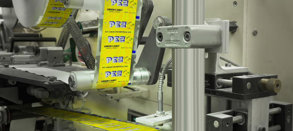 Keeping PEZ tablets rolling consistently with print upgrade