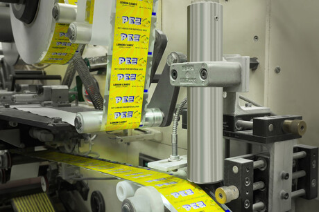 Keeping PEZ tablets rolling consistently with print upgrade