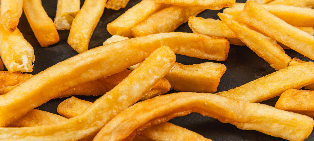 Processing method to lower oil in French fries