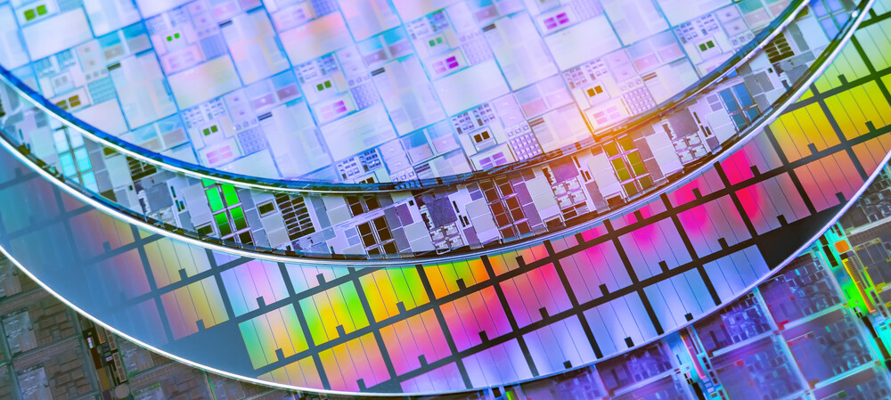 Building upward: silicon stacking to extend Moore's law