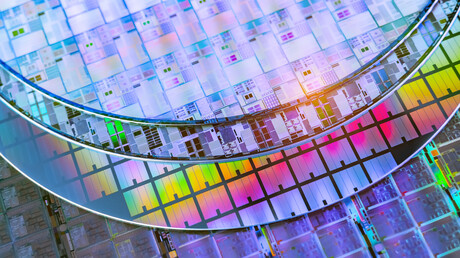 Building upward: silicon stacking to extend Moore's law