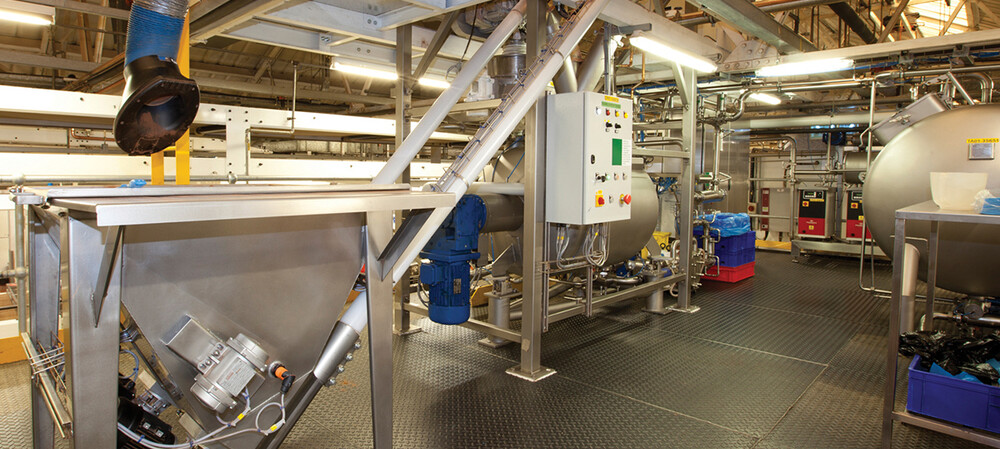 Dual conveying systems automate chocolate cream production