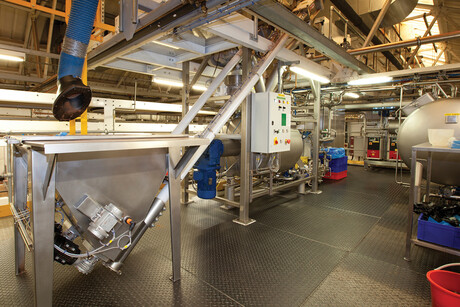 Dual conveying systems automate chocolate cream production