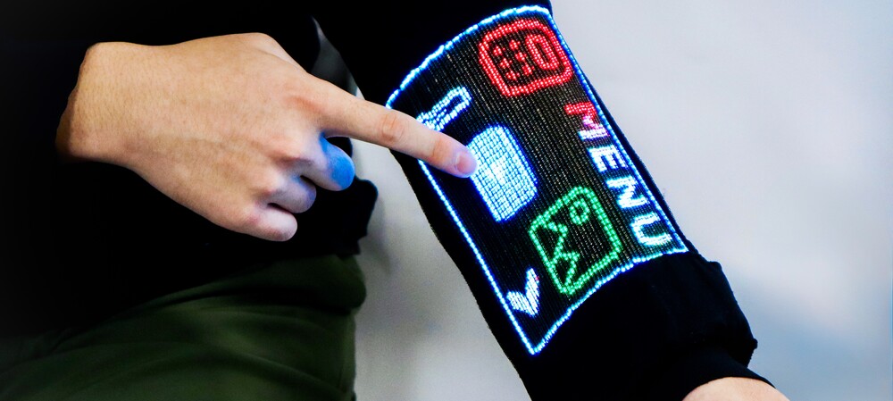 Smart textile sleeve integrates display, touch and sensors