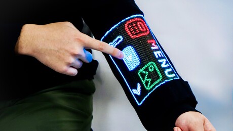Smart textile sleeve integrates display, touch and sensors